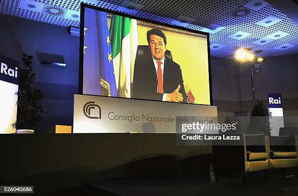 Italian Prime Minister Matteo Renzi who was expected at the celebration of the 30th anniversary of Internet in Italy speaks via Skype at the CNR of...