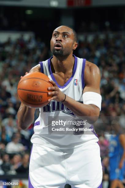 Kenny Thomas of the Sacramento Kings shoots a free throw against the Orlando Magic during the game at Arco Arena on March 15, 2005 in Sacramento,...