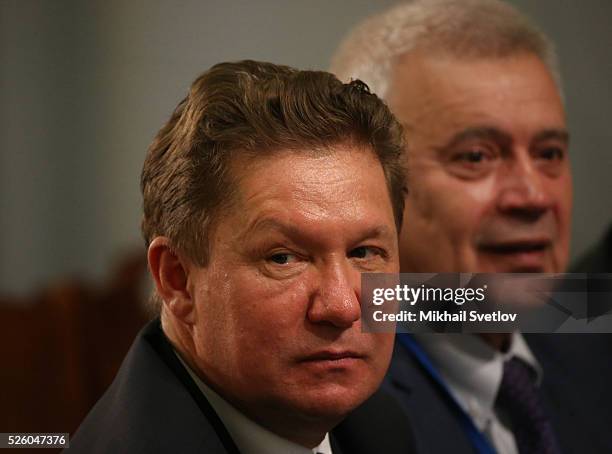 Gazprom's CEO Alexei Miller and President of Lukoil Vagit Alekperov attend the meeting of the Board of Trustees of the Russian Geographic Society on...