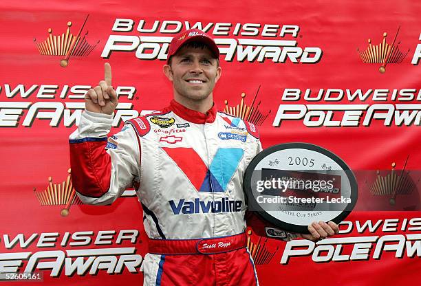 Scott Riggs, driver of the Valvoline Chevrolet, poses after winning the pole during NASCAR NEXTEL Cup Advance Auto Parts 500 qualifying on April 8,...