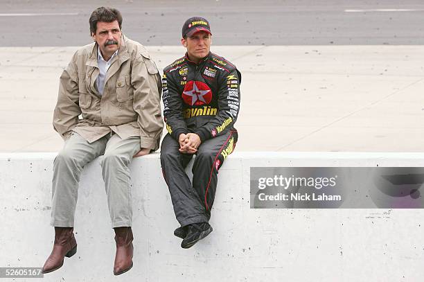 President Mike Helton sits with Jamie McMurray driver of the Ganassi Racing Texaco/Havoline Dodge during the NASCAR NEXTEL Cup Advance Auto Parts 500...