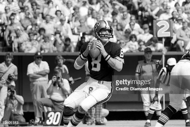 Quarterback Archie Manning of the New Orleans Saints drops back to pass during a game on September 24, 1978 against the Cincinnati Bengals at...