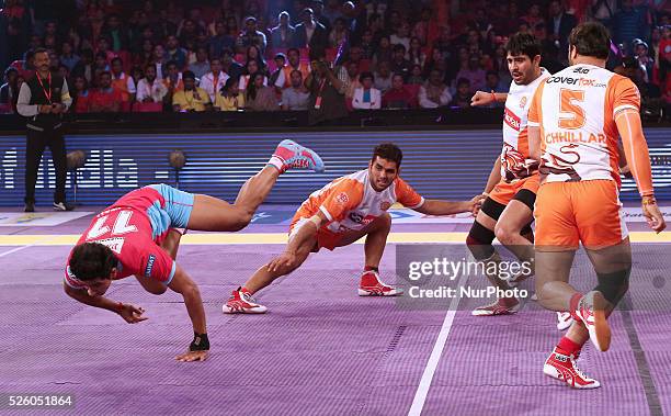 Players in action during the Pro Kabbadi league match between Telgu Titans and Bengaluru Bulls at Sawai Mansingh indoor Stadium in Jaipur , India on...