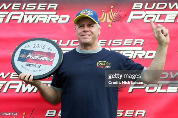 Bobby Hamilton driver of the Bailey's Dodge celebrates pole position during the NASCAR Craftsman Truck Series Kroger 250 qualifying on April 8, 2005...