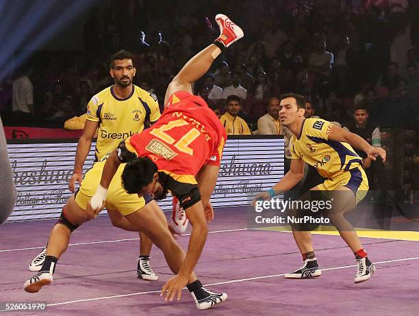 Players in action during the Pro Kabbadi league match between Telgu Titans and Bengaluru Bulls at Sawai Mansingh indoor Stadium in Jaipur , India on...