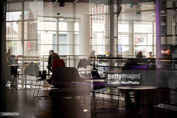 People are seen reading in the public library in The Hague on Friday, May 1st. Contrary to many other EU states Labour Day is not a day off from work...