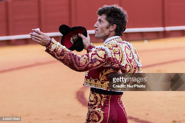 Bullfighter Manuel Escribano celebrates after win an ear during a bullfight of the &quot;Feria de Abril&quot; celebrated at Real Maestranza de...