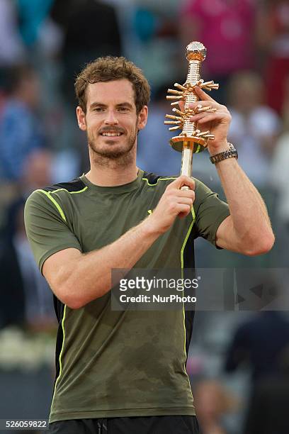 Andy Murray of Great Britain with his winners trophy after his straight sets victory against Rafael Nadal of Spain in the mens final during day nine...