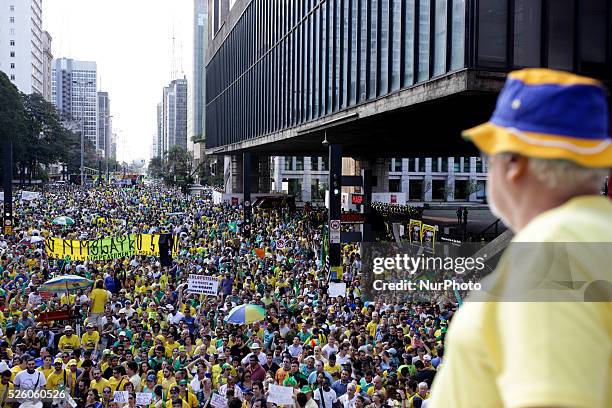 Thousands of people take to Paulista Avenue in Sao Paulo, Brazil to protest against the government of the president Dilma Rousseff on August 16,...