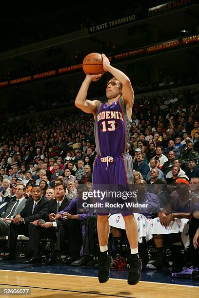 Steve Nash of the Phoenix Suns shoots against the Golden State Warriors April 8, 2005 at the Oakland Arena in Oakland, California. NOTE TO USER: User...