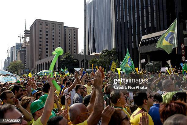 Thousands of people take to Paulista Avenue in Sao Paulo, Brazil to protest against the government of the president Dilma Rousseff on August 16,...