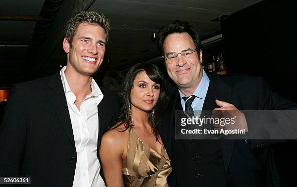 Actor Ryan McPartlin and wife Danielle pose with actor Dan Aykroyd at a party for the premiere the new TV series "Living With Fran" sponsored by...