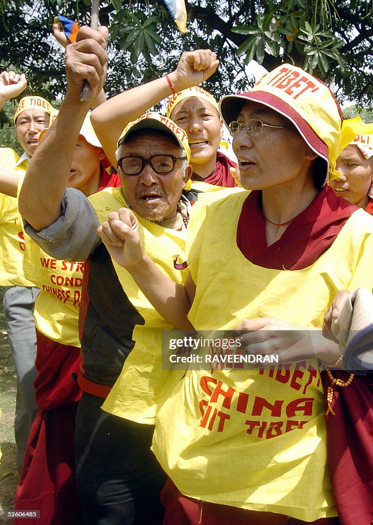 Tibetan protesters shout anti-Chinese sl