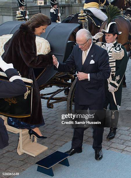 King Carl Gustaf of Sweden and Queen Silvia of Sweden arrive by carriage to the Nordic Museum to attend a concert of the Royal Swedish Opera and...
