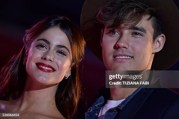 Argentinian singer and actress Martina Stoessel poses with actor Jorge Blanco before the premiere of the movie Tini - La Nuova Vita Di Violetta , on...