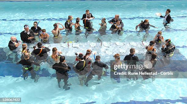 Guests attend "The World's Largest Formal Underwater Dinner Party", a Guinness Book Of Records attempt at The Park Club.