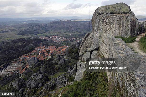 Picture taken 03 April 2005 shows the Mideavil castel in ruins, further down the historical village of Monsanto, 250 km from Lisbon. AFP PHOTO/ Paulo...