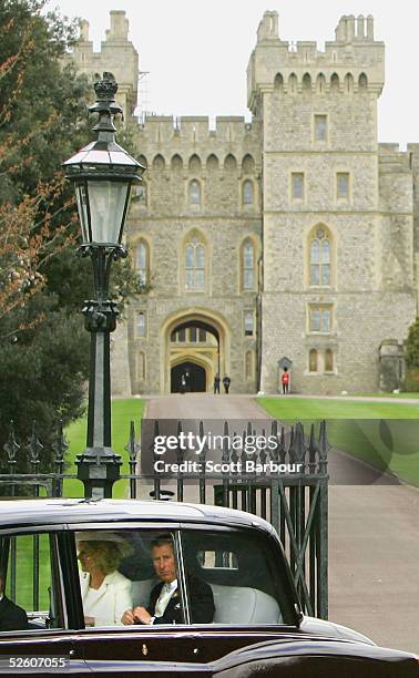 Britain's HRH Prince Charles and Mrs Camilla Parker Bowles depart for Windsor Guildhall together by car to attend their Civil Ceremony where they...