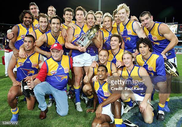 Eagles players celebrate winning the round three "Western Derby" AFL match between the West Coast Eagles and Fremantle Dockers at Subiaco Oval on...