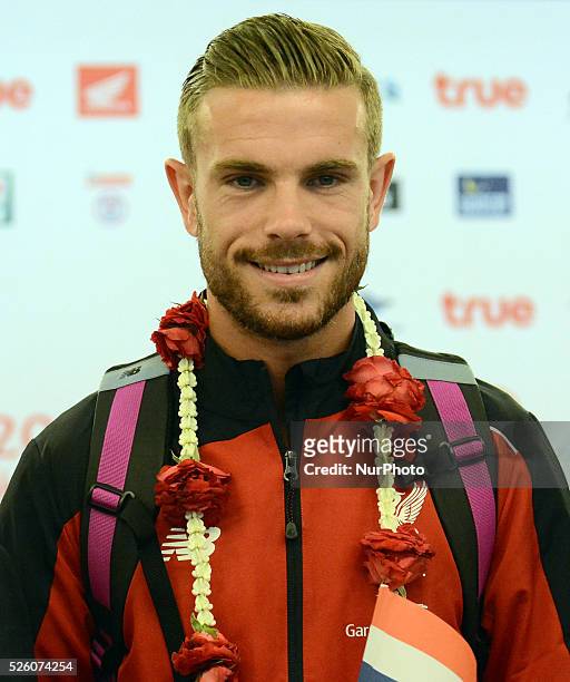 Liverpool captain Jordan Henderson poses for a picture as he arrives at Suvarnabhumi airport in Samut Prakan, Thailand on July 13, 2015. Liverpool...