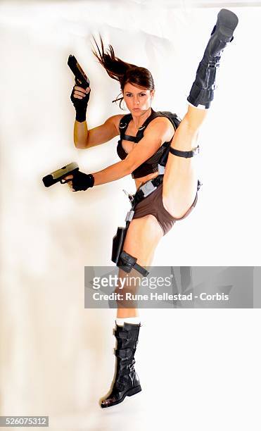 Actress Alison Carroll attends a photo call as the new face of the Lara Croft character in conjunction with the launch of the game "Tomb Raider:...