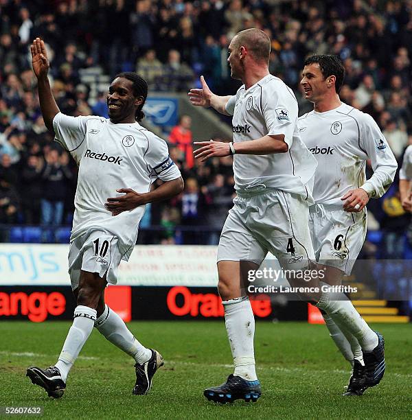 Jay Jay Okocha of Bolton celebrates his goal with Kevin Nolan and Gary Speed during the FA Barclays Premiership match between Bolton Wanderers and...