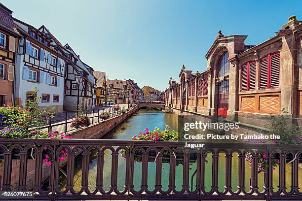 a bridge over a channel in colmar - alsace stock pictures, royalty-free photos & images
