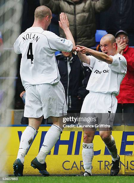 Stelios of Bolton celebrates the third goal with Kevin Nolan during the FA Barclays Premiership match between Bolton Wanderers and Fulham at The...