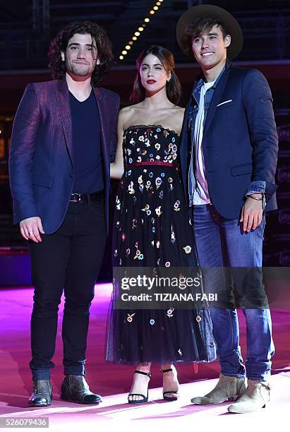 Argentinian singer and actress Martina Stoessel poses with actors Jorge Blanco and Adrian Salzedo before the premiere of the movie Tini - La Nuova...
