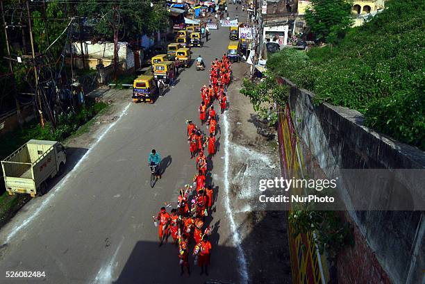 Indian hindu devotees moves for their Kanwar yatra on the first day of sacred month of Shravan in Allahabad on August 1,2015. The Yatra takes place...