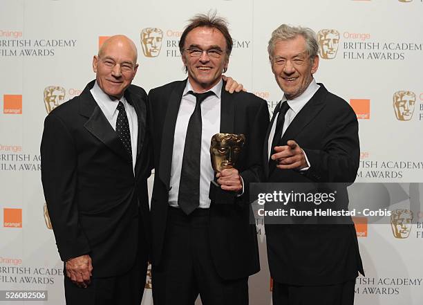 Patrick Stewart, Danny Boyle and Ian McKellen pose in the press room at the "Orange British Academy Film Awards" at Royal Opera House, in London.