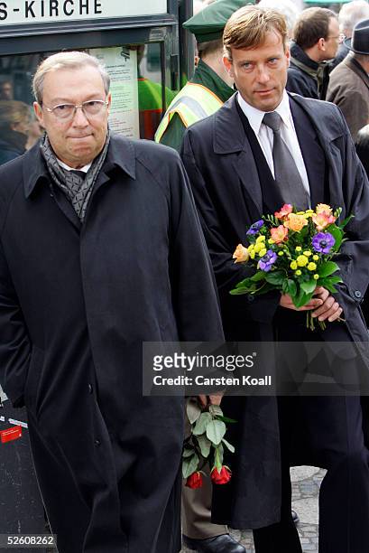 Actors Jaecki Schwarz and Hagen Henning arrive at the funeral services of late German actor Harald Juhnke at the Gedaechtniskirche church April 9,...