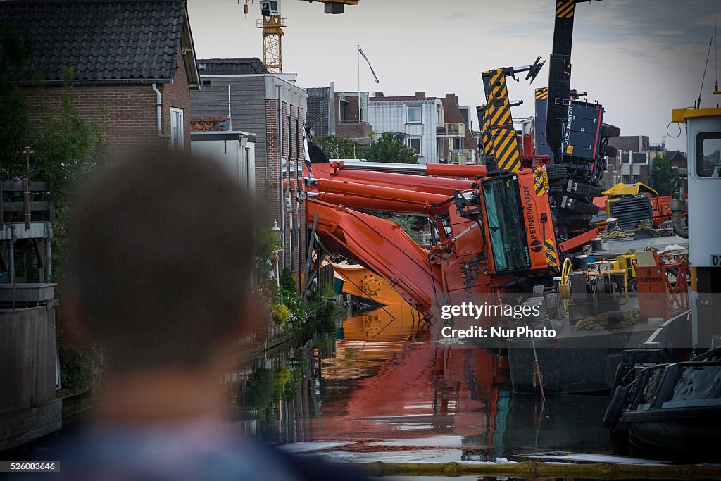 Heavy cranes destroy houses in Netherlands