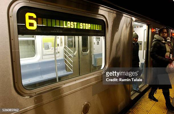 Train unloads passengers on the last stop at City Hall in New York City, as the the midnight deadline passes for an MTA strike on Thursday, December...