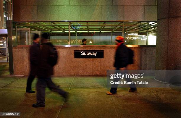 Passengers enter a subway station in New York City, as the the midnight deadline passes for an MTA strike on Thursday, December 15 2005. The New York...