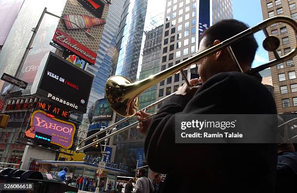 Nine member jazz ensemble ��Speakeasy Jazz Babies�� lead a New Orleans style funeral procession through Times Square bidding farewell to winter and...