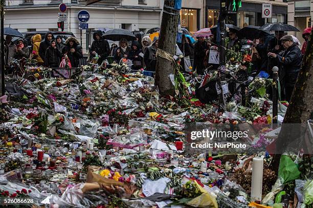 Flowers, candles and messages left as a memorial in &quot;La Belle Equipe&quot; restaurant in the 11th district of Paris, on November 21, 2015...