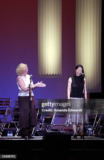 Revlon/UCLA Breast Center Director Dr. Helena Chang and Sherry Goldman greet the audience at "What a Pair! 3" at UCLA's Royce Hall on April 8, 2005...