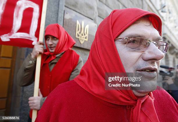 Activists depicting elderly soviet generation grandmothers who likes russian TV chanels, during their performance in Kiev, Ukraine, 03 December,...
