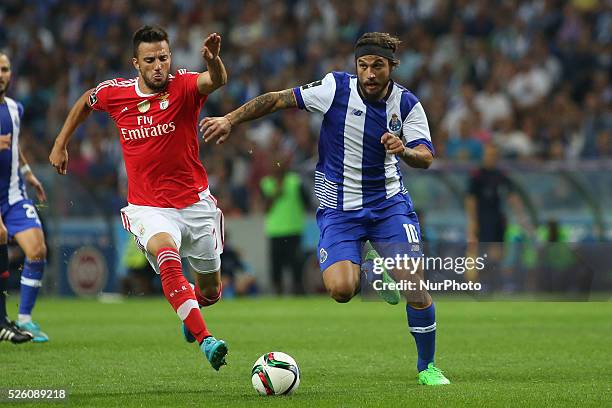 Benfica's Greek midfielder Andreas Samaris and Porto's Itaian forward Pablo Osvaldo in action during the Premier League 2015/16 match between FC...