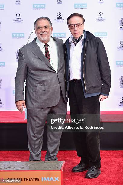 Honoree Francis Ford Coppola and writer/director Peter Bogdanovich attend the Francis Ford Coppola Hand and Footprint Ceremony during the TCM Classic...