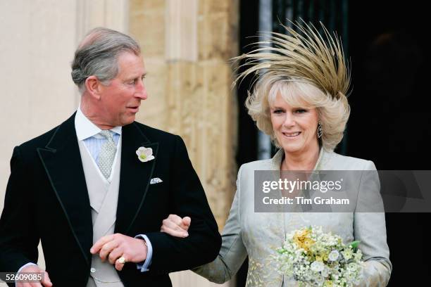 Prince Charles, the Prince of Wales, and his wife Camilla, the Duchess Of Cornwall, in a blue silk dress by Robinson Valentine and head-dress by...