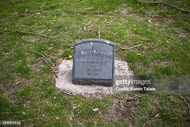 Stone marks a time capsule by the students of P.S. 26 which was once a elementary school in Governors Island in New York City. In 2003 Governors...
