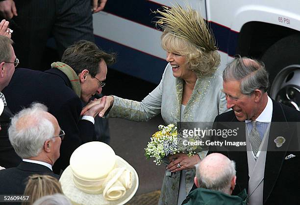 Prince Charles, the Prince of Wales, and his wife Camilla, the Duchess of Cornwall, greet well-wishers after the Service of Prayer and Dedication...
