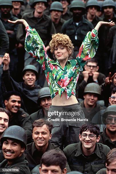 American actress and Academy Award-winner Sissy Spacek with U.S. Army troops on location during television filming of Verna: USO Girl in Baumholder,...