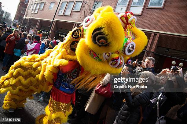 British Chinese celebrate Chinese New Year with dragon and lion dance performance in Chinatown of London. The celebration attracts thousands of...