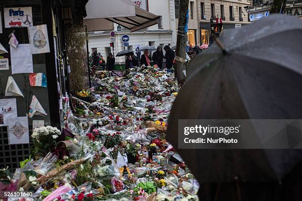 Flowers, candles and messages left as a memorial in &quot;La Belle Equipe&quot; restaurant in the 11th district of Paris, on November 21, 2015...