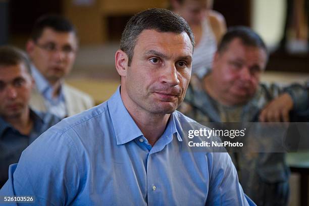 Ukraine's burly boxing hero and strident protest leader Vitali Klitschko, who claimed victory Sunday in Kiev mayoral vote, comes to Kiev city council...