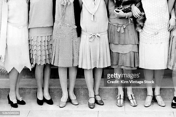 Group of high school flapper girls pose for a formal portrait, ca. 1925