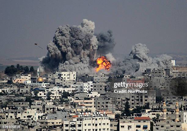 Smoke rises after an attack of Israeli aircraft in the east of Gaza City on July 29, 2014. The home of Hamas Gaza political leader Ismail Haniyeh was...